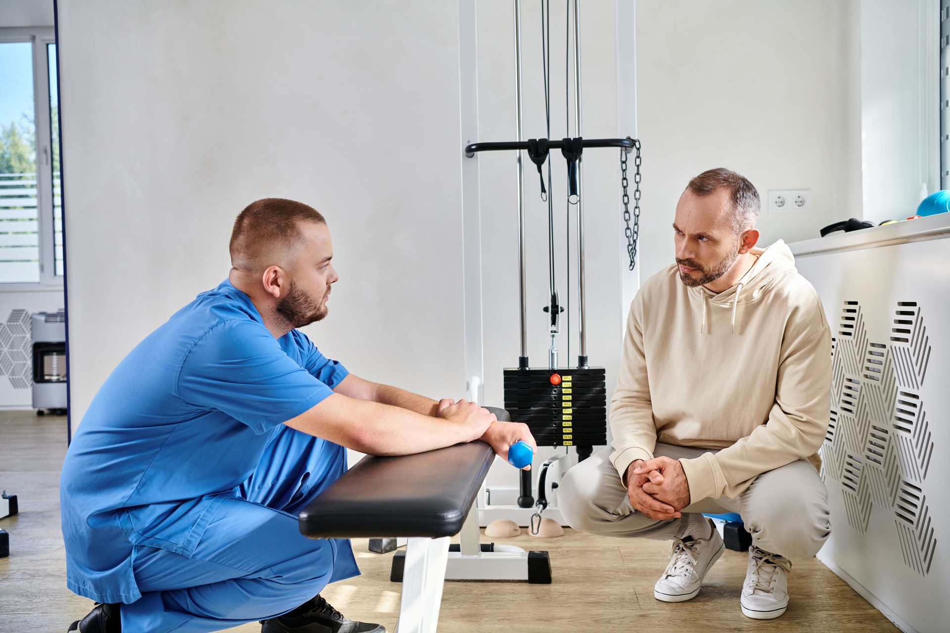 A focused consultation between a patient and a healthcare professional during rehabilitation